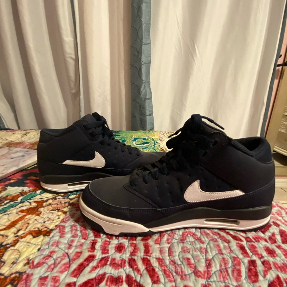 Blue and white nike high top shoes